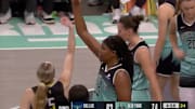 Paige Bueckers twirled her finger alongside Jonquel Jones after scoring an and-one.