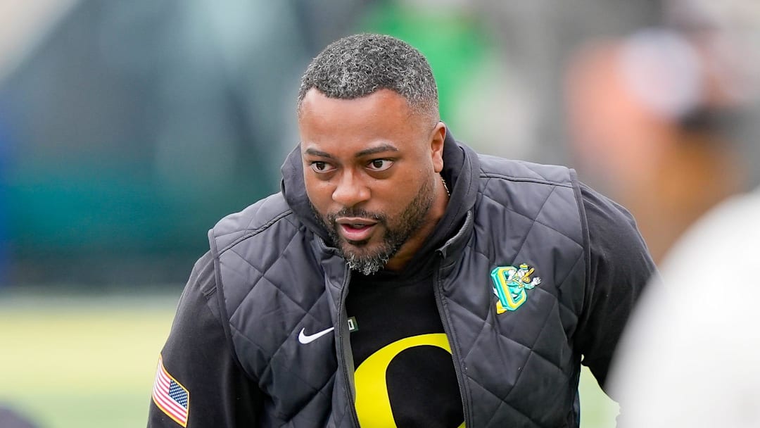 Oregon wide receivers coach Ross Douglas works with players during Oregon’s spring game on April 26, 2025, at Autzen Stadium in Eugene.