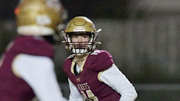 St. Augustine High quarterback Locklan Hewlett (11) is one of 23 verbal commitments to the USF Class of 2025. 