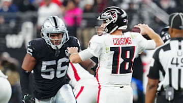 Dec 16, 2024; Paradise, Nevada, USA; Las Vegas Raiders linebacker Amari Burney (56) looks to sack Atlanta Falcons quarterback Kirk Cousins (18) during the third quarter at Allegiant Stadium. Mandatory Credit: Stephen R. Sylvanie-Imagn Images