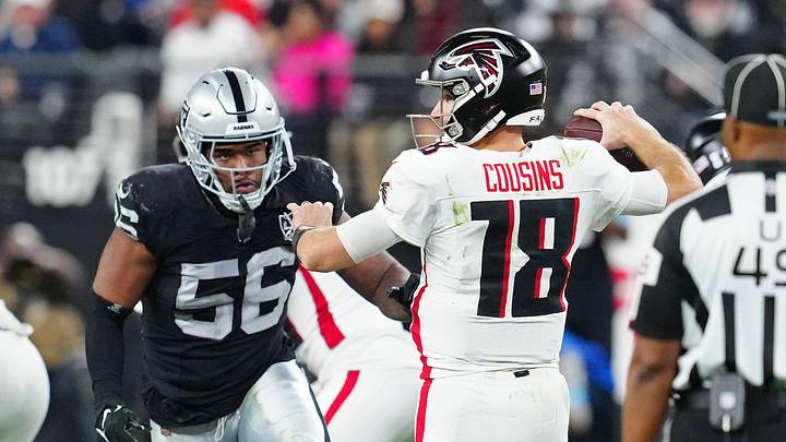 Dec 16, 2024; Paradise, Nevada, USA; Las Vegas Raiders linebacker Amari Burney (56) looks to sack Atlanta Falcons quarterback Kirk Cousins (18) during the third quarter at Allegiant Stadium. Mandatory Credit: Stephen R. Sylvanie-Imagn Images