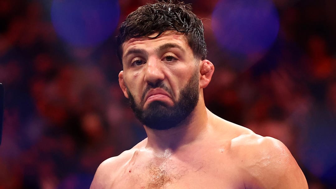 Apr 13, 2024; Las Vegas, Nevada, USA; Arman Tsarukyan (blue gloves) reacts after defeating Charles Oliveira (not pictured)  during UFC 300 at T-Mobile Arena. Mandatory Credit: Mark J. Rebilas-Imagn Images