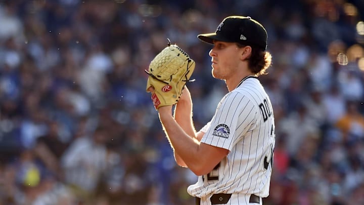 Jun 25, 2025; Denver, Colorado, USA; Colorado Rockies pitcher Chase Dollander (32) throws during the first inning against the Los Angeles Dodgers at Coors Field. Mandatory Credit: Christopher Hanewinckel-Imagn Images Jun 25, 2025; Denver, Colorado, USA; Colorado Rockies pitcher Chase Dollander (32) throws during the first inning against the Los Angeles Dodgers at Coors Field. Mandatory Credit: Christopher Hanewinckel-Imagn Images