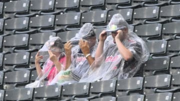 Jun 23, 2024; Cleveland, Ohio, USA; Fans sit in the stands during a rain delay between the Cleveland Guardians and the Toronto Blue Jays at Progressive Field. Mandatory Credit: David Richard-USA TODAY Sports