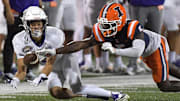 Aug 29, 2025; Champaign, Illinois, USA;  Illinois Fighting Illini defensive back Torrie Cox Jr. (5) deflects a pass intended for Western Illinois Leathernecks wide receiver Demari Davis (3) during the first half at Memorial Stadium. Mandatory Credit: Ron Johnson-Imagn Images