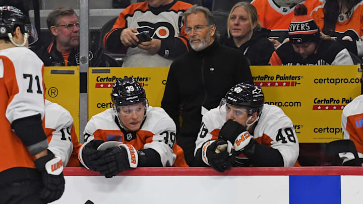 Dec 21, 2024; Philadelphia, Pennsylvania, USA; Philadelphia Flyers head coach John Tortorella behind the bench against the Columbus Blue Jackets during the second period at Wells Fargo Center. Mandatory Credit: Eric Hartline-Imagn Images