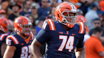 Oct 12, 2024; Champaign, Illinois, USA;  Illinois Fighting Illini offensive lineman J.C. Davis (74) in the first half against the Purdue Boilermakers at Memorial Stadium. Mandatory Credit: Ron Johnson-Imagn Images