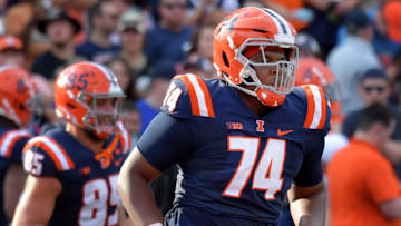 Oct 12, 2024; Champaign, Illinois, USA;  Illinois Fighting Illini offensive lineman J.C. Davis (74) in the first half against the Purdue Boilermakers at Memorial Stadium.