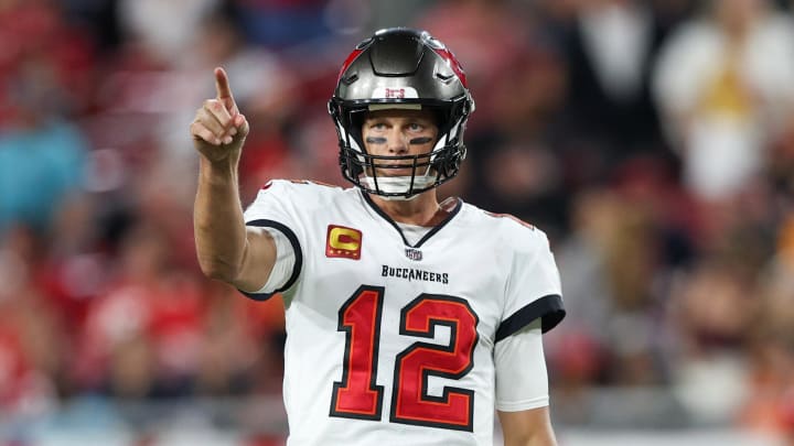 Oct 2, 2022; Tampa, Florida, USA;  Tampa Bay Buccaneers quarterback Tom Brady (12) signals a play against the Kansas City Chiefs in the fourth quarter at Raymond James Stadium. Mandatory Credit: Nathan Ray Seebeck-USA TODAY Sports