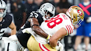 Aug 23, 2024; Paradise, Nevada, USA; Las Vegas Raiders linebacker Amari Gainer (53) tackles San Francisco 49ers tight end Jake Tonges (88) during the first quarter at Allegiant Stadium. Mandatory Credit: Stephen R. Sylvanie-Imagn Images