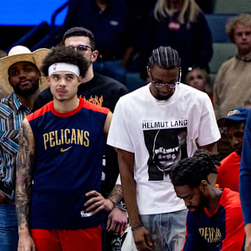 Apr 11, 2025; New Orleans, Louisiana, USA;  New Orleans Pelicans bench reacts to a play against the Miami Heat during the first half at Smoothie King Center. Mandatory Credit: Stephen Lew-Imagn Images