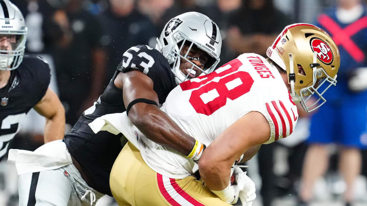 Aug 23, 2024; Paradise, Nevada, USA; Las Vegas Raiders linebacker Amari Gainer (53) tackles San Francisco 49ers tight end Jake Tonges (88) during the first quarter at Allegiant Stadium. Mandatory Credit: Stephen R. Sylvanie-USA TODAY Sports