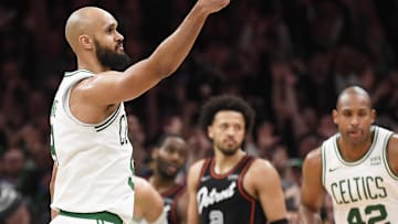 Dec 28, 2023; Boston, Massachusetts, USA;  Boston Celtics guard Derrick White (9) reacts after