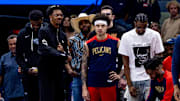 Apr 11, 2025; New Orleans, Louisiana, USA;  New Orleans Pelicans bench reacts to a play against the Miami Heat during the first half at Smoothie King Center. Mandatory Credit: Stephen Lew-Imagn Images