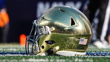 Oct 26, 2024; East Rutherford, New Jersey, USA; A Notre Dame Fighting Irish helmets rests on the field before the game between the Fighting Irish and the Navy Midshipmen at MetLife Stadium. Mandatory Credit: Vincent Carchietta-Imagn Images