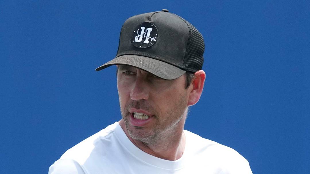 Indianapolis Colts head coach Shane Steichen speaks with a player in OTAs