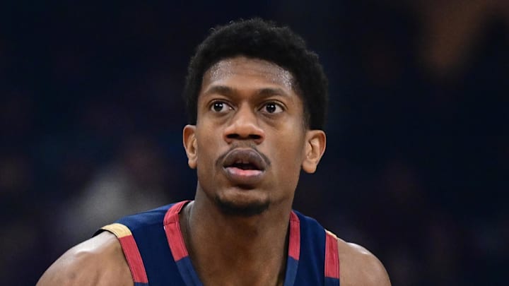 Jan 2, 2026; Cleveland, Ohio, USA; Cleveland Cavaliers forward De'Andre Hunter (12) looks to shoot against Denver Nuggets forward Zeke Nnaji (22) during the first half at Rocket Arena. Mandatory Credit: David Dermer-Imagn Images