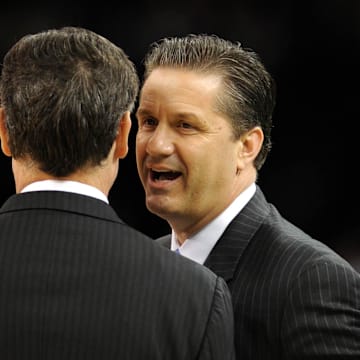 Mar 31, 2012; New Orleans, LA, USA; Kentucky Wildcats head coach John Calipari (right) greets Louisville Cardinals head coach Rick Pitino before the semifinals of the 2012 NCAA men's basketball Final Four at the Mercedes-Benz Superdome. Mandatory Credit: Bob Donnan-Imagn Images