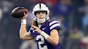 Dec 26, 2024; Phoenix, AZ, USA; Kansas State Wildcats quarterback Avery Johnson (2) against the Rutgers Scarlet Knights during the Rate Bowl at Chase Field. Mandatory Credit: Mark J. Rebilas-Imagn Images