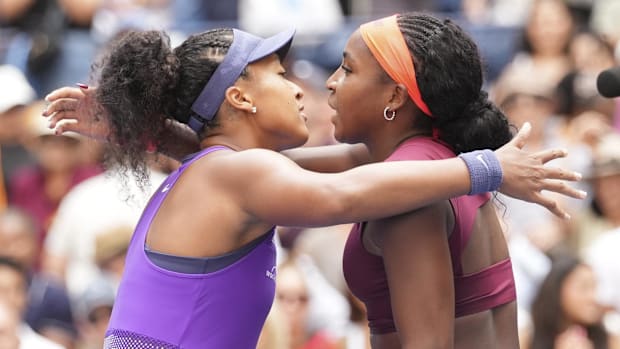 Naomi Osaka and Coco Gauff hug after their match