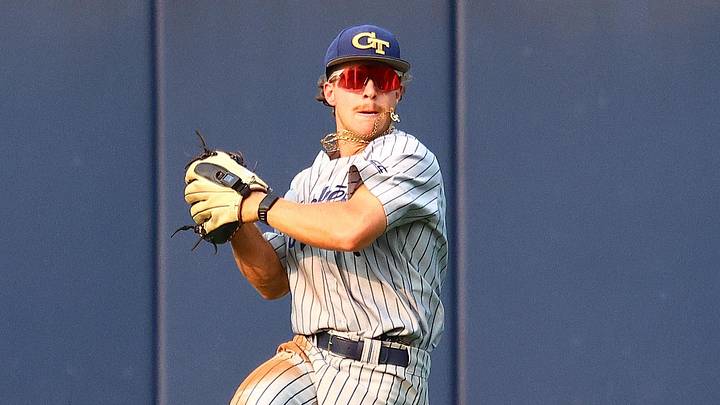 May 31, 2025; Oxford, MS, USA; Georgia Tech Yellowjackets outfielder Drew Burress (8) fields the ball during the first inning against the Murray State Racers. Mandatory Credit: Petre Thomas-Imagn Images