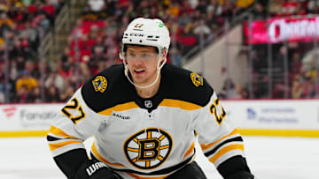 Oct 31, 2024; Raleigh, North Carolina, USA;  Boston Bruins defenseman Hampus Lindholm (27) skates against the Carolina Hurricanes during the third period at Lenovo Center. Mandatory Credit: James Guillory-Imagn Images