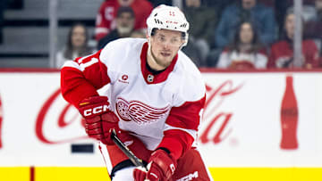 Feb 1, 2025; Calgary, Alberta, CAN; Detroit Red Wings right wing Vladimir Tarasenko (11) in action against the Calgary Flames during the first period at Scotiabank Saddledome. Mandatory Credit: Brett Holmes-Imagn Images