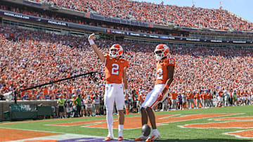Sep 21, 2024; Clemson, South Carolina, USA; Clemson Tigers quarterback Cade Klubnik (2) waves to the crowd after running in for a touchdown against the North Carolina State Wolfpack at Memorial Stadium. Mandatory Credit: Ken Ruinard-Imagn Images