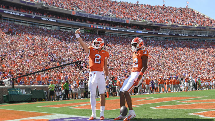 Sep 21, 2024; Clemson, South Carolina, USA; Clemson Tigers quarterback Cade Klubnik (2) waves to the crowd after running in for a touchdown against the North Carolina State Wolfpack at Memorial Stadium. Mandatory Credit: Ken Ruinard-Imagn Images