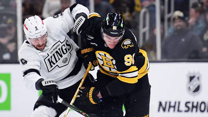 Mar 10, 2026; Boston, Massachusetts, USA; Los Angeles Kings right wing Adrian Kempe (9) and Boston Bruins defenseman Nikita Zadorov (91) battle for the puck during the first period at TD Garden. Mandatory Credit: Bob DeChiara-Imagn Images Mar 10, 2026; Boston, Massachusetts, USA; Los Angeles Kings right wing Adrian Kempe (9) and Boston Bruins defenseman Nikita Zadorov (91) battle for the puck during the first period at TD Garden. Mandatory Credit: Bob DeChiara-Imagn Images
