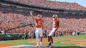 Sep 21, 2024; Clemson, South Carolina, USA; Clemson Tigers quarterback Cade Klubnik (2) waves to the crowd after running in for a touchdown against the North Carolina State Wolfpack at Memorial Stadium. Mandatory Credit: Ken Ruinard-Imagn Images
