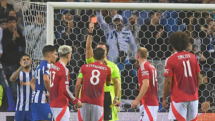 Bruno Fernandes (fourth left) is sent off against Porto