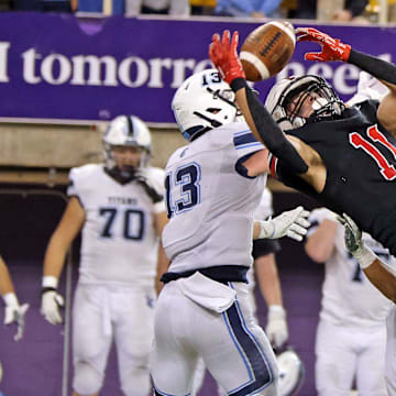A near completion as the Lewis Central Titans compete against the Western Dubuque Bobcats for the Class 4A championship on Thursday, November 16, 2023 at the UNI-Dome in Cedar Falls.