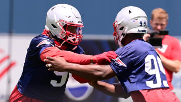Jun 10, 2024; Foxborough, MA, USA;  New England Patriots linebacker Matthew Judon (9) works with New England Patriots defensive end Keion White (99) at minicamp at Gillette Stadium. Mandatory Credit: Eric Canha-USA TODAY Sports