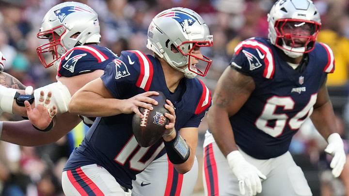 New England Patriots quarterback Drake Maye (10) scrambles out of the pocket against the Arizona Cardinals at State Farm Stadium on Dec 15, 2024.