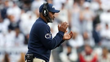 Penn State Nittany Lions interim head coach Terry Smith celebrates from the sideline during the third quarter against the Indiana Hoosiers at Beaver Stadium. 