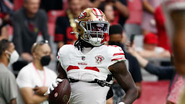 Oct 10, 2021; Glendale, Arizona, USA; San Francisco 49ers running back Trey Sermon (28) warms up before the game against the Arizona Cardinals at State Farm Stadium. Mandatory Credit: Chris Coduto-Imagn Images