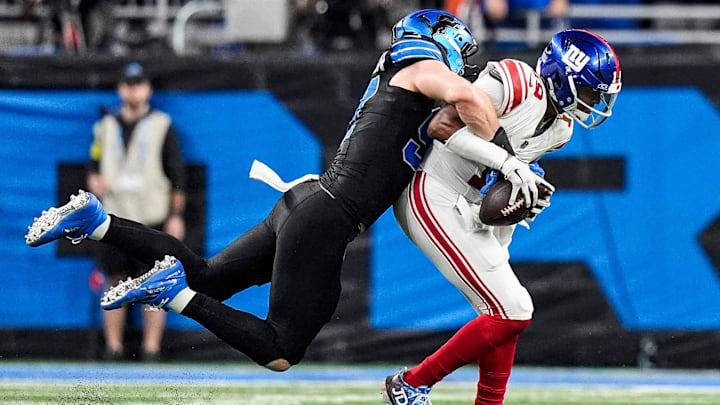 Detroit Lions defensive end Aidan Hutchinson (97) sacked New York Giants quarterback Jameis Winston (19) during the overtime at Ford Field in Detroit on Sunday, Nov. 23, 2025.