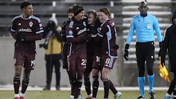 Colorado Rapids midfielder Djordje Mihailovic (10) (center) celebrates his free kick goal with midfielder Cole Bassett (23), midfielder Oliver Larraz (8) and defender Ian Murphy (19) in the second half at Dick's Sporting Goods Park 