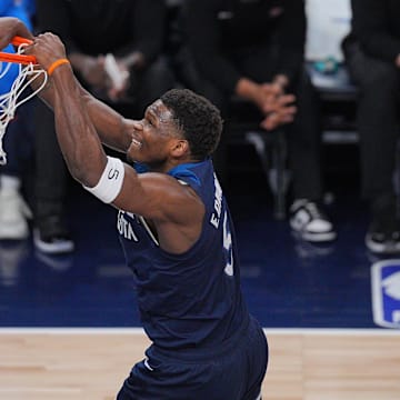 May 24, 2025; Minneapolis, Minnesota, USA; Minnesota Timberwolves guard Anthony Edwards (5) dunks the ball against the Oklahoma City Thunder during the first half in game three of the western conference finals for the 2025 NBA Playoffs at Target Center. Mandatory Credit: Brad Rempel-Imagn Images