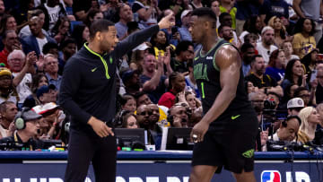 Apr 14, 2024; New Orleans, Louisiana, USA; New Orleans Pelicans head coach Willie Green gives direction to forward Zion Williamson (1) on a time out against the Los Angeles Lakers during the first half at Smoothie King Center.