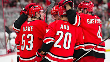 Apr 2, 2025; Raleigh, North Carolina, USA;  Carolina Hurricanes right wing Jackson Blake (53) celebrates a goal with center Seth Jarvis (24), left wing Taylor Hall (71), defenseman Shayne Gostisbehere (4) and center Sebastian Aho (20) against the Washington Capitals during the first period at Lenovo Center. Mandatory Credit: James Guillory-Imagn Images