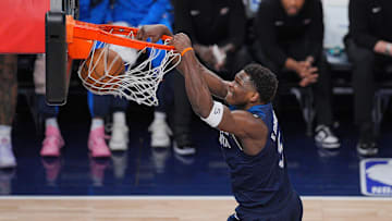 May 24, 2025; Minneapolis, Minnesota, USA; Minnesota Timberwolves guard Anthony Edwards (5) dunks the ball against the Oklahoma City Thunder during the first half in game three of the western conference finals for the 2025 NBA Playoffs at Target Center. Mandatory Credit: Brad Rempel-Imagn Images