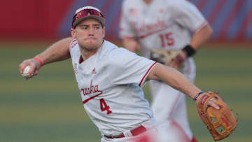 Nebraska junior Joshua Overbeek (4) looks to make a Kansas out in the third inning of the Buck O'Neil Classic at Hoglund Ballpark Tuesday, April 9.