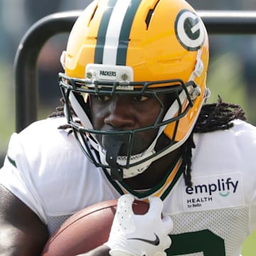 Green Bay Packers running back Israel Abanikanda runs through a drill at training camp on Aug. 1.