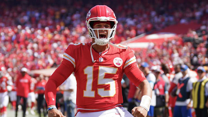 Aug 17, 2024; Kansas City, Missouri, USA; Kansas City Chiefs quarterback Patrick Mahomes (15) celebrates toward fans against the Detroit Lions prior to the game at GEHA Field at Arrowhead Stadium. Mandatory Credit: Denny Medley-Imagn Images