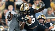 Vanderbilt defensive line coach Larry Black and Vanderbilt defensive lineman Khordae Sydnor (96) celebrate Sydnor's second-half fumble recovery during their game at FirstBank Stadium in Nashville, Tenn., 