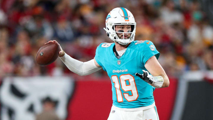 Aug 23, 2024; Tampa, Florida, USA; Miami Dolphins quarterback Skylar Thompson (19) drops back to pass against the Tampa Bay Buccaneers in the second quarter during preseason at Raymond James Stadium.