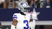 Dallas Cowboys wide receiver George Pickens celebrates after scoring a touchdown in the fourth quarter against the Green Bay Packers at AT&T Stadium.