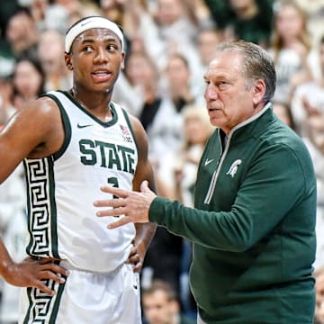 Michigan State's coach Tom Izzo, right, talks with Jeremy Fears Jr. during the first half against Colgate on Monday, Nov. 3, 2025, at the Breslin Center in East Lansing.